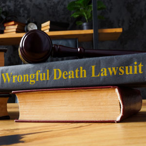 Gavel on book titled 'Wrongful Death Lawsuit' representing legal claims for wrongful death cases - Law Offices of Daniel L. Clayton