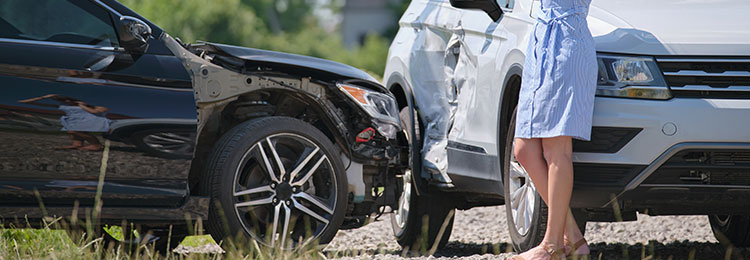 Two cars in a collision, symbolizing car accident claims - Law Offices of Daniel L. Clayton